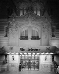 A black and white photo of the monte carlo hotel.