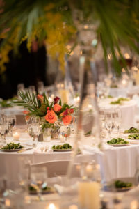 Dining table decorated with flower vase